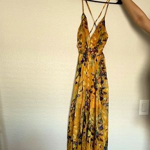 Low V cut maxi dress. Straps cross in the back, open back. Only used once
